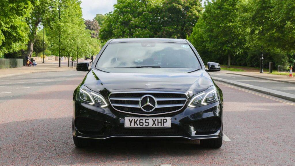 A modern Mercedes automobile parked on the road